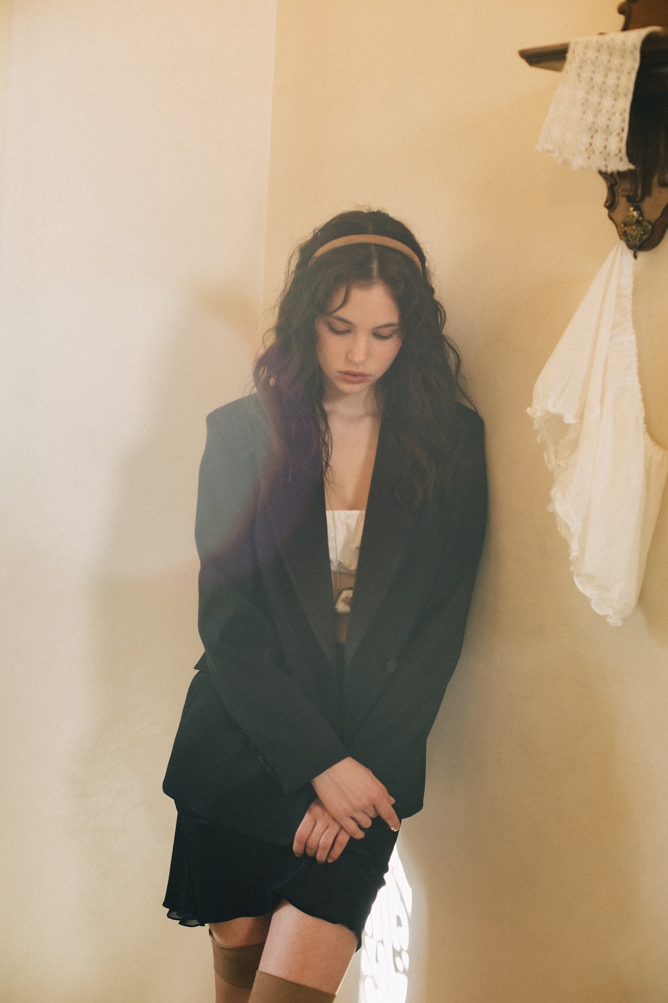 Mini skirt made of black silk with a chiffon insert