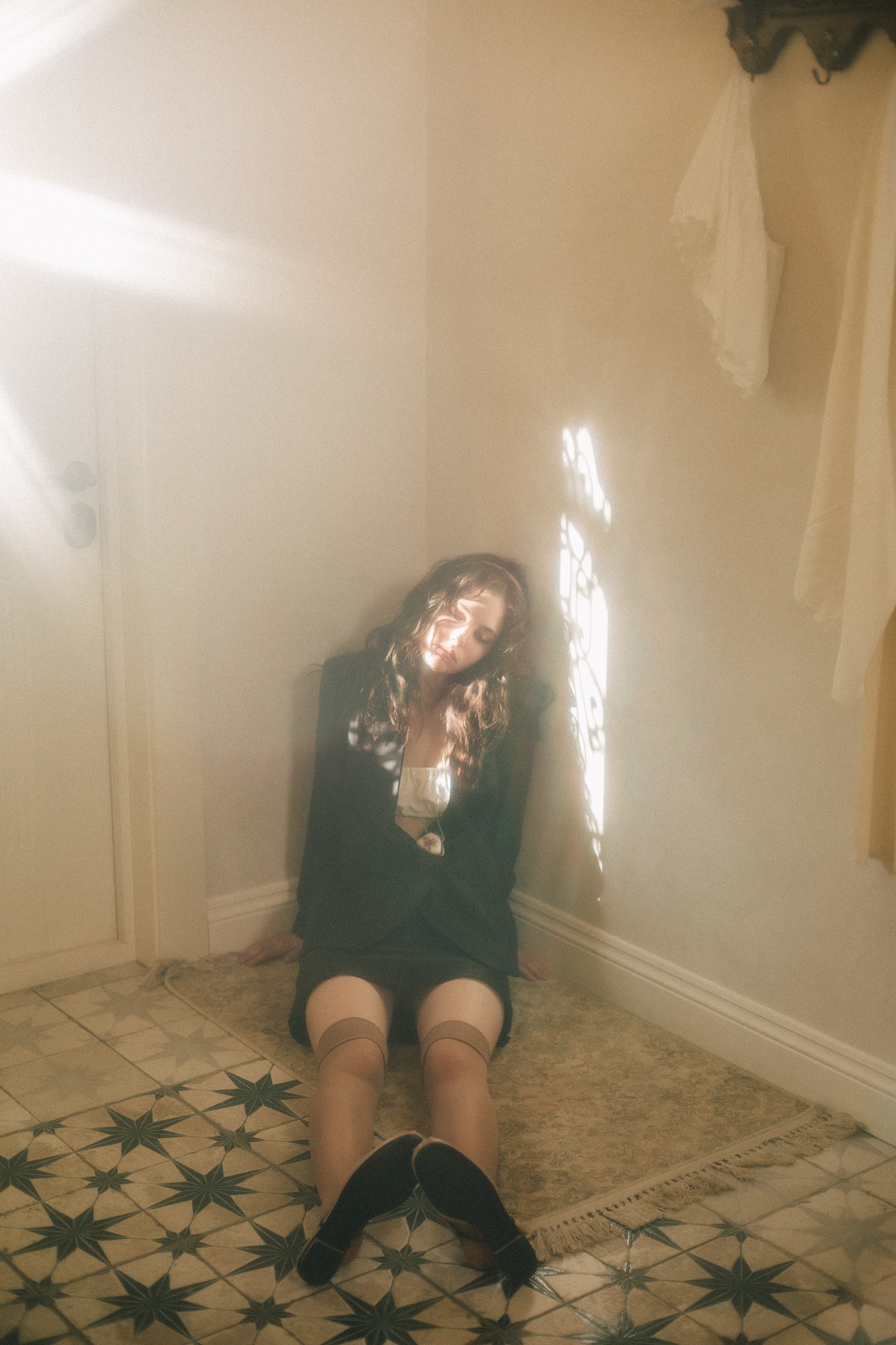 Mini skirt made of black silk with a chiffon insert